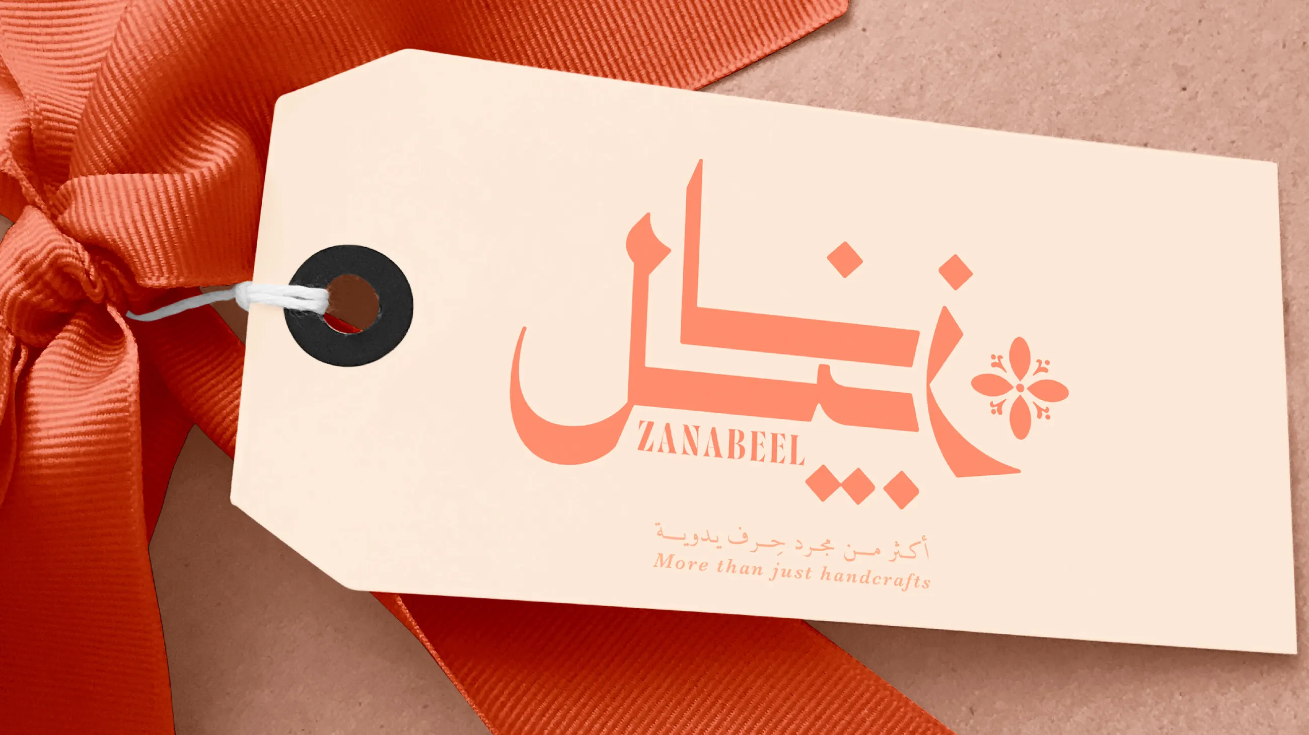 Zanabeel gift tag tied with an orange ribbon