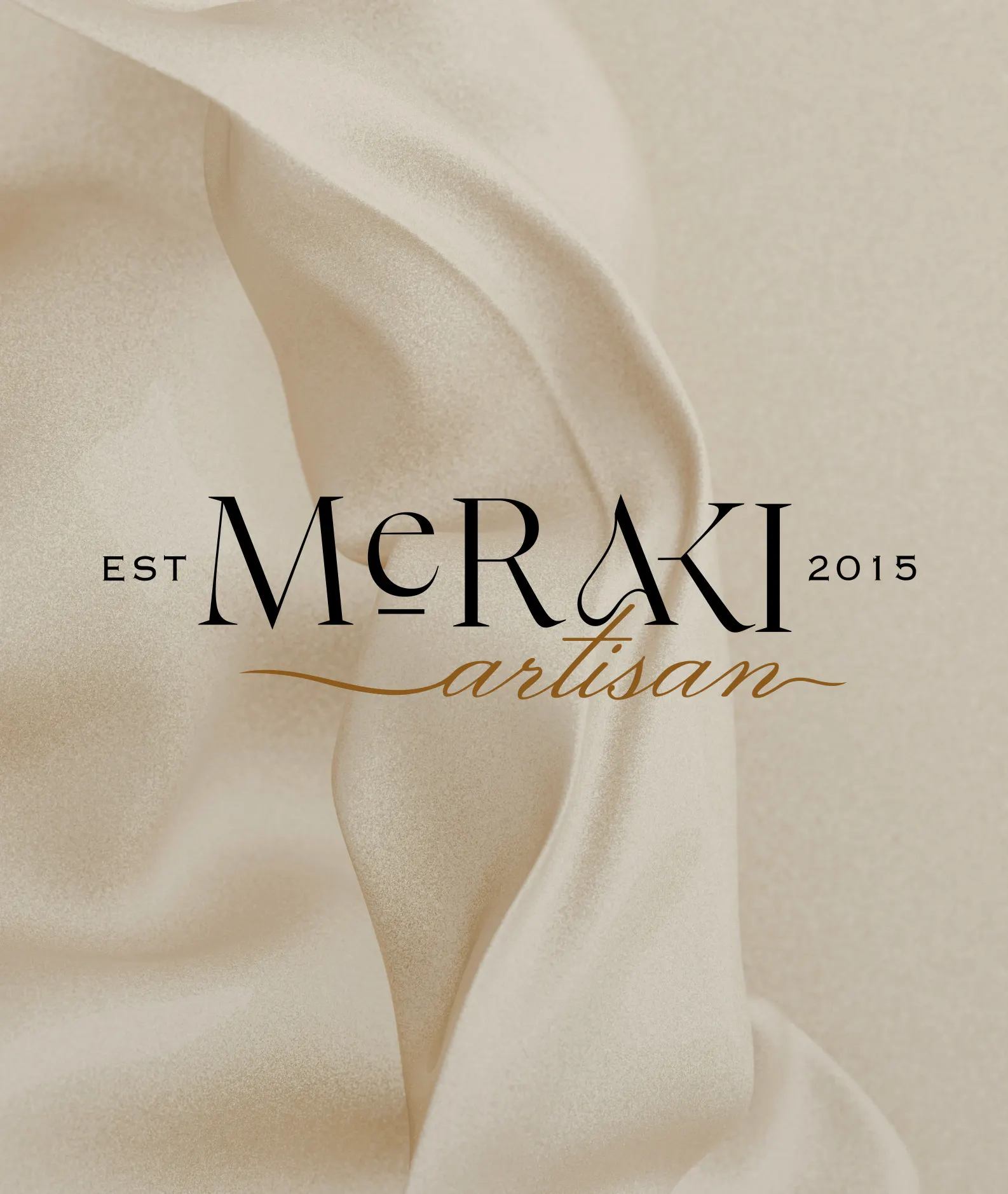 Meraki Artisan logotype on cream silk